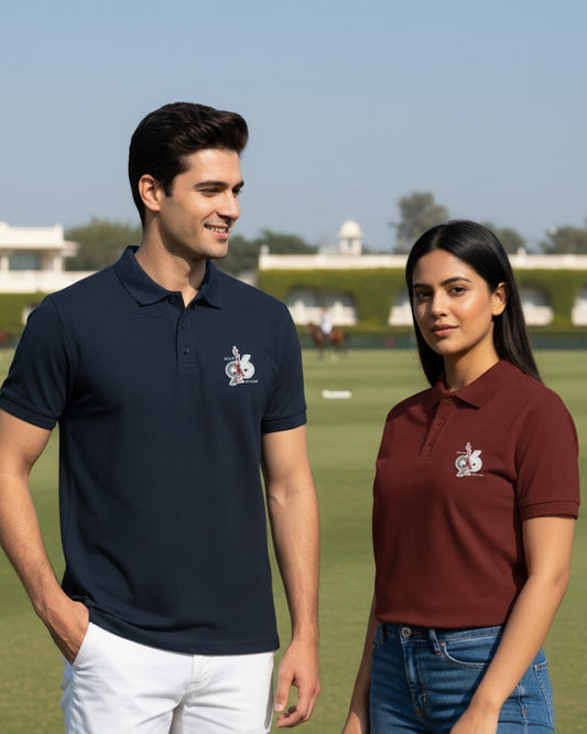 Two people wearing navy and maroon polos with a BITS Pilani logo on a grassy field.