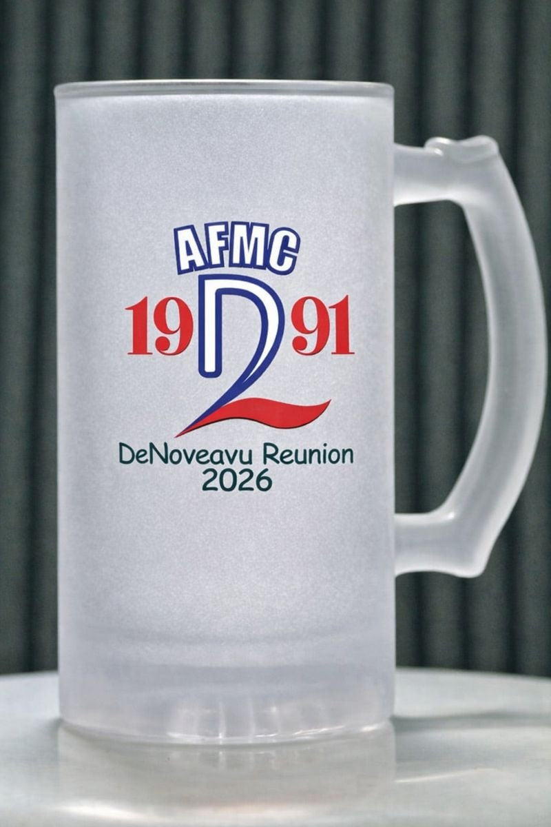 Frosted mug with AFMC 1991 DeNoveavu Reunion 2026 text on a gray background