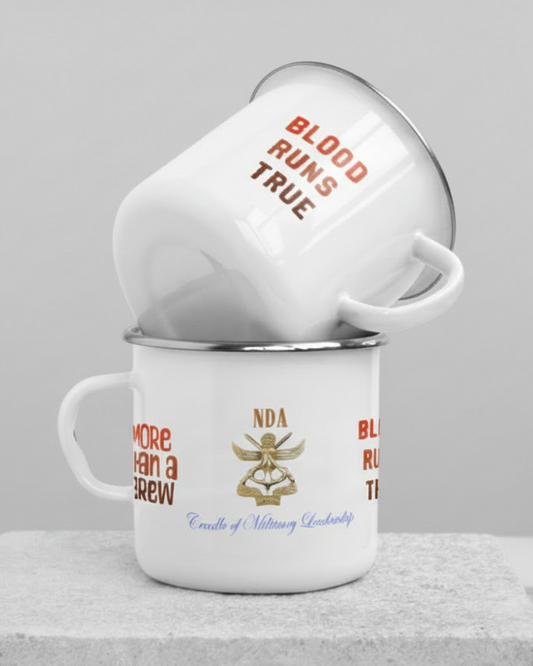 White enamel mug with text and logo on a light green background