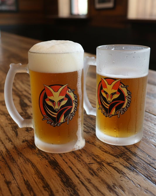 Two frosted mugs with a foxtrot squadron NDA logo.