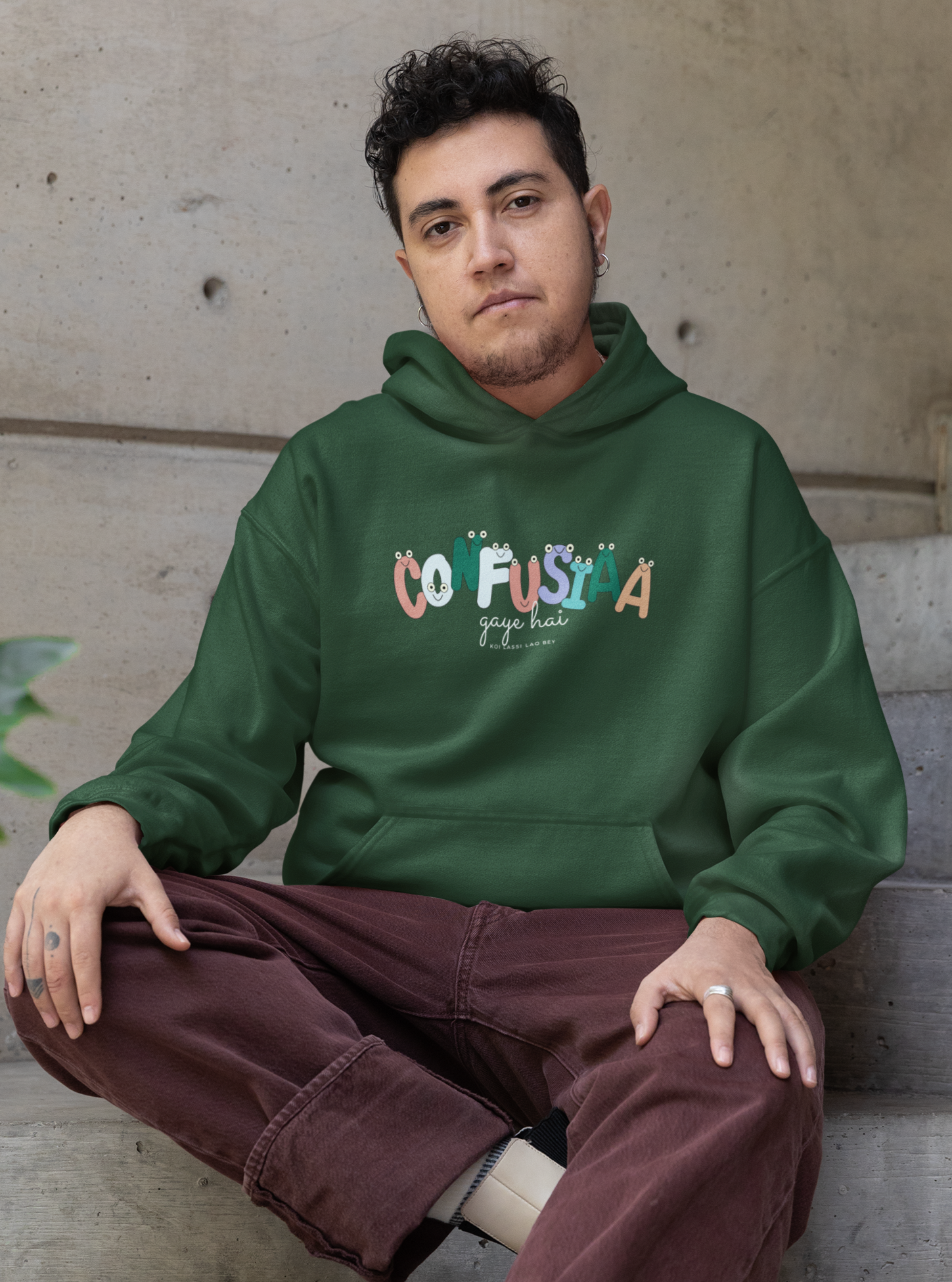 Confusiaa Gaye Hai quirky desi humor hoodie in bottle green – Indian funny sweatshirt | Indipeepal