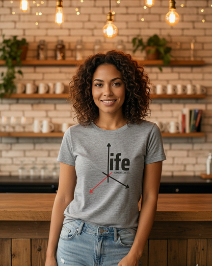 Woman wearing a melange gray t-shirt with 'ife' design in an urban setting