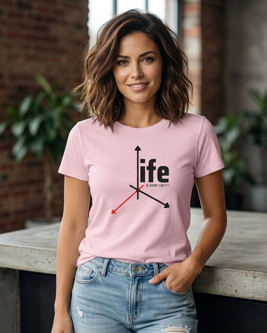 Woman wearing a pink t-shirt with 'life' design in a casual setting